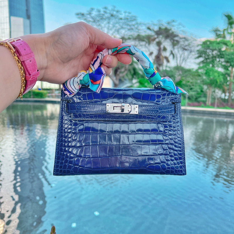 Side view of understated structured handbag