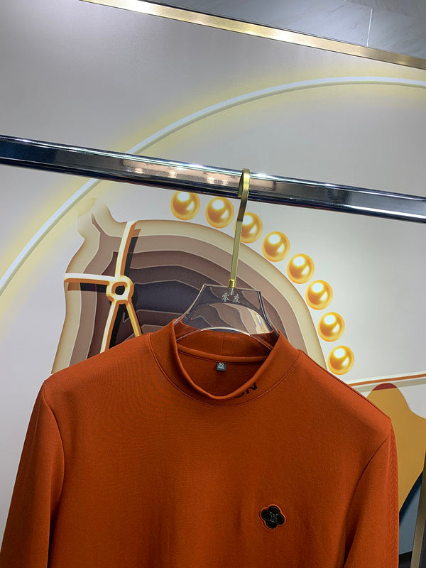 Close-up detail shot of Louis Vuitton luxury clothing with monogram-inspired silhouette