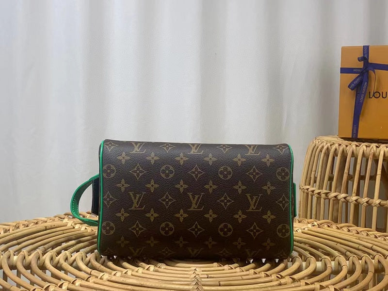 Side profile of elevated signature women's handbag – women's statement bag