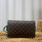 Side profile of elevated signature women's handbag – women's statement bag