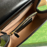 Close-up detail of polished refined women's handbag – women's designer-style accessory