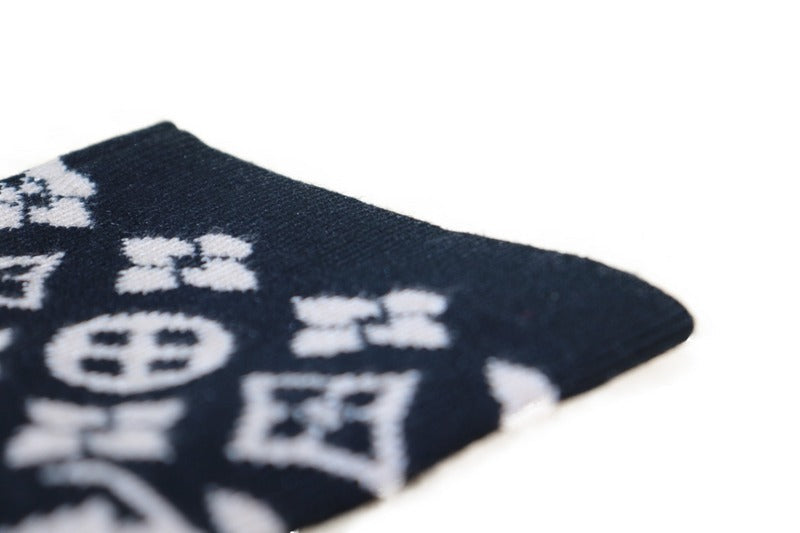 Front view of Louis Vuitton luxury clothing with logo-detail design