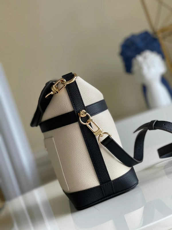 Styled lifestyle shot of everyday-luxe modern women's handbag – women's luxury accessory