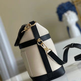 Styled lifestyle shot of everyday-luxe modern women's handbag – women's luxury accessory