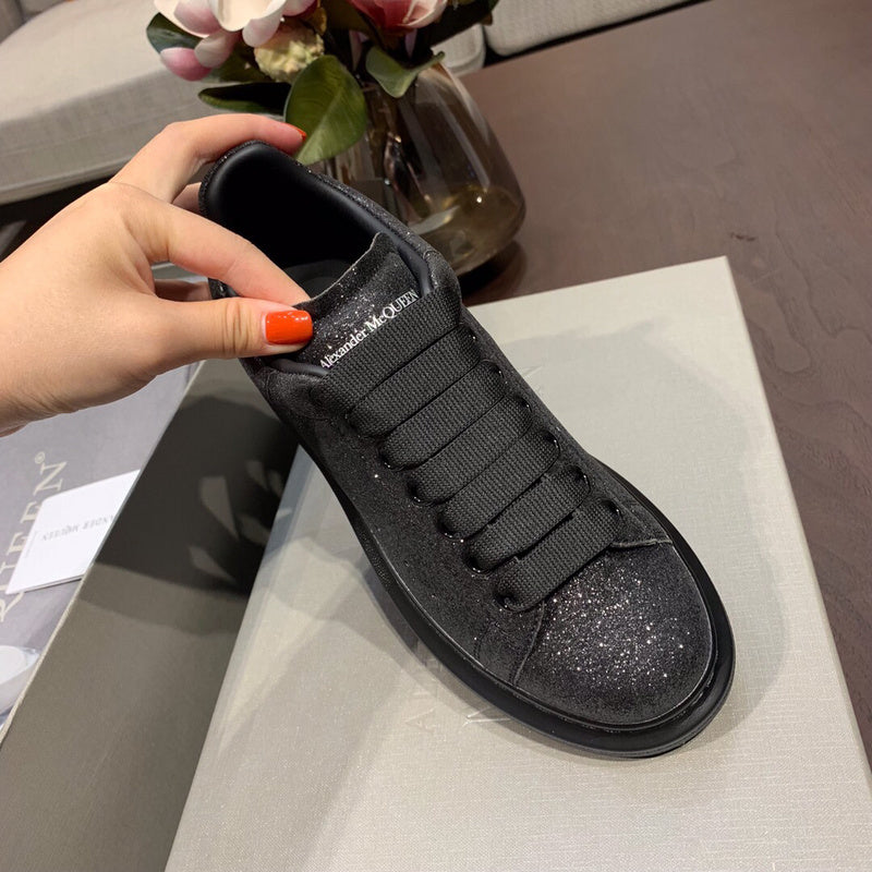 Alexander McQueen sneakers detailed view showing premium designer craftsmanship