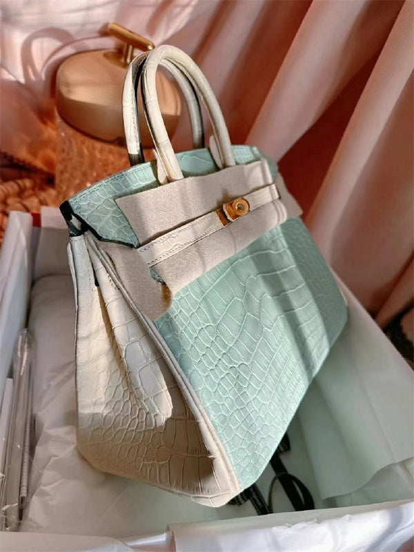 Side view of structured structured handbag