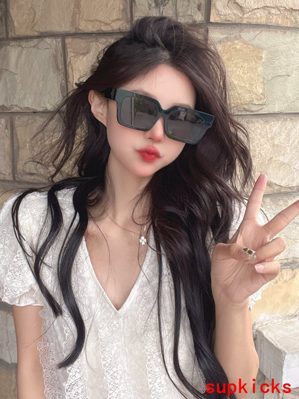 Lifestyle view of Louis Vuitton unisex sunglasses