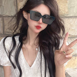 Lifestyle view of Louis Vuitton unisex sunglasses
