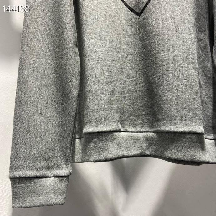 Front view of Louis Vuitton luxury clothing with everyday silhouette