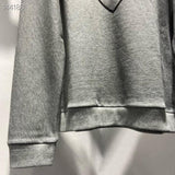 Front view of Louis Vuitton luxury clothing with everyday silhouette