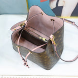 Top view of signature structured women's handbag – women's luxury accessory