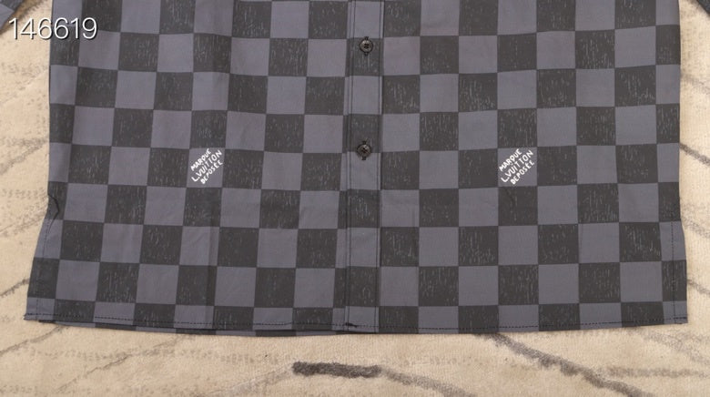 Close-up detail shot of Louis Vuitton luxury clothing with relaxed-fit cut