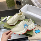 Gucci classic monochrome luxury sneakers view 10 retro runner design