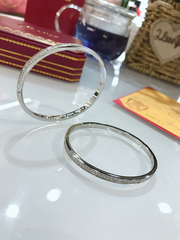 Side view of Cartier unisex jewelry piece