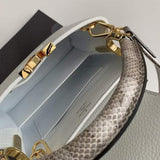 Front view of polished chic women's handbag – women's luxury accessory