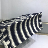 Back view of modern statement women's handbag – women's luxury accessory