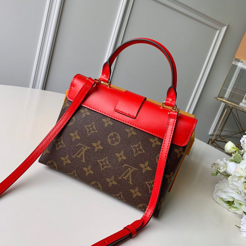 Side profile of structured signature women's handbag – women's designer-style accessory