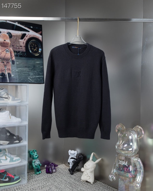 Side profile of Louis Vuitton luxury clothing with signature branding