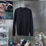 Side profile of Louis Vuitton luxury clothing with signature branding