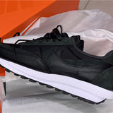 Nike Men's & Women's Premium Low-Top Trainers — Style 025 angle view