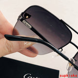 Close-up detail view of Cartier unisex sunglasses