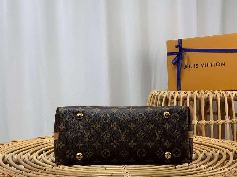 Styled lifestyle shot of statement classic women's handbag – women's luxury accessory