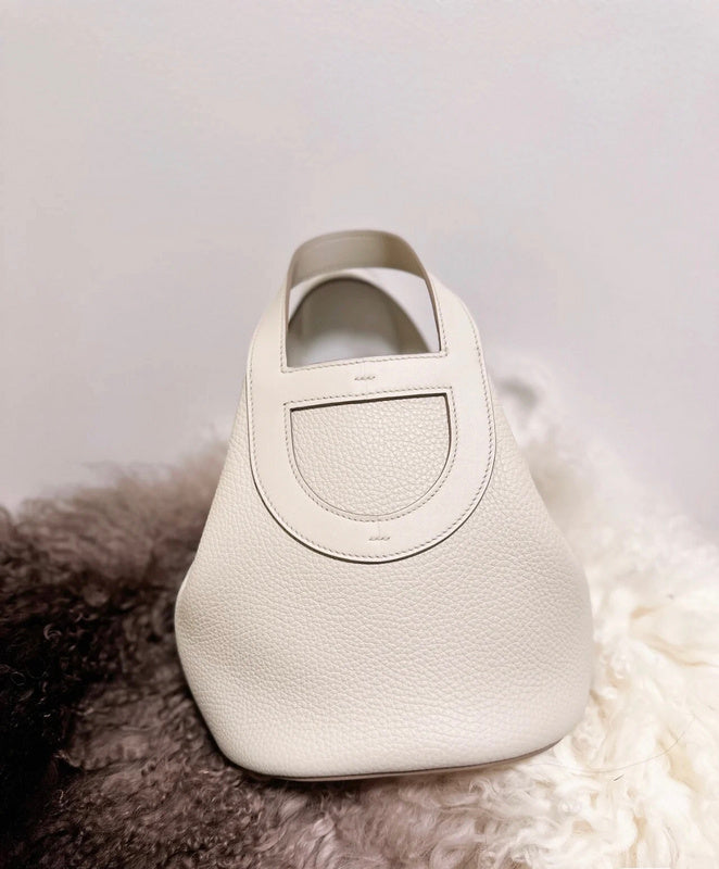 Side view of balanced structured handbag