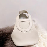Side view of balanced structured handbag
