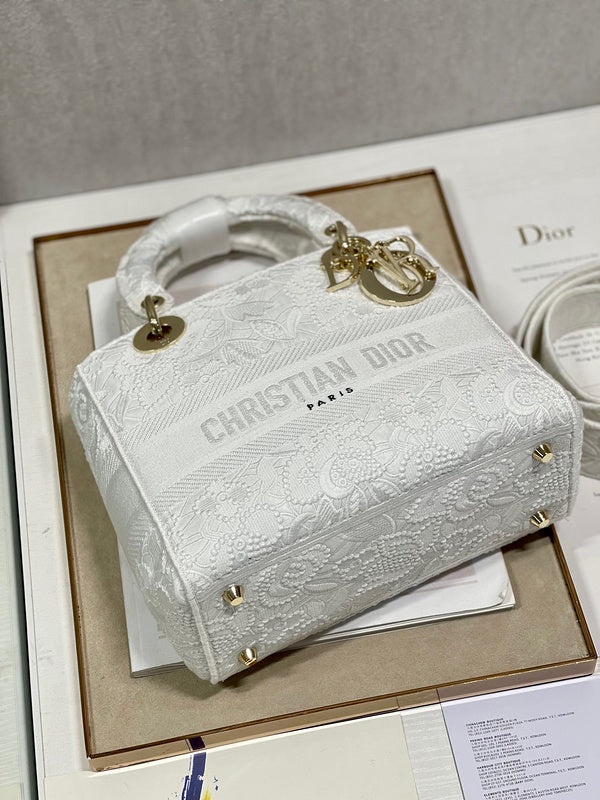Styled lifestyle shot of chic classic women's handbag – women's designer-style accessory