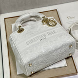 Styled lifestyle shot of chic classic women's handbag – women's designer-style accessory