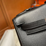 Side view of sculpted structured handbag