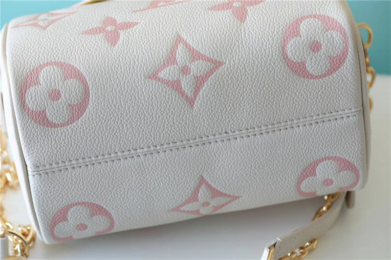  Refined top-handle bag carried on shoulder