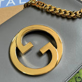 Styled lifestyle shot of refined sleek women's handbag – women's luxury accessory