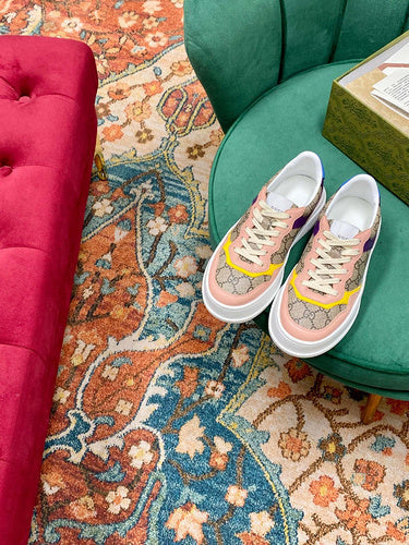 Gucci crisp white luxury sneakers view 11 retro runner design