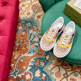 Gucci crisp white luxury sneakers view 11 retro runner design