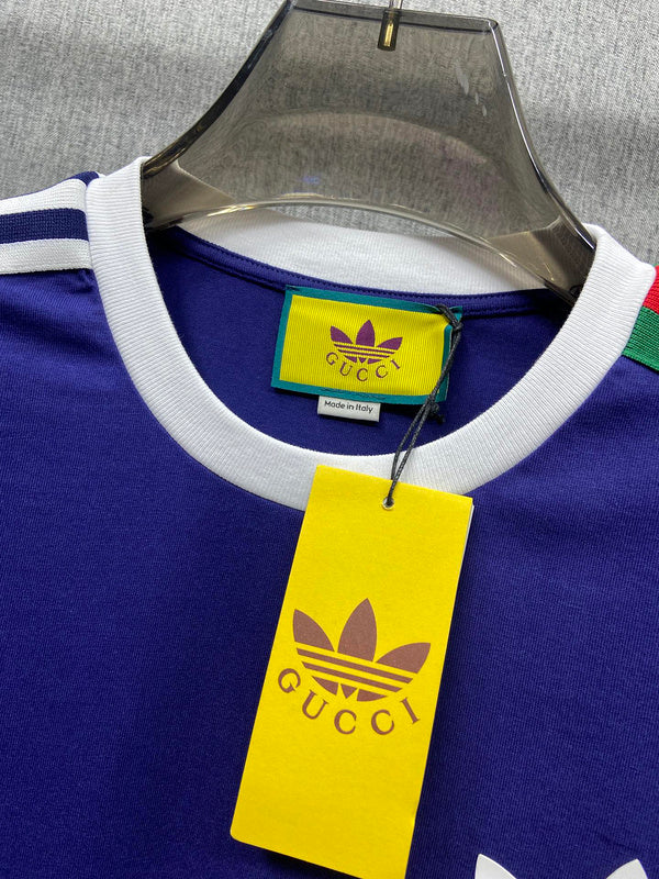 Close-up detail shot of Gucci luxury clothing with logo-detail design