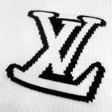 Full styled look of Louis Vuitton luxury clothing with monogram-inspired silhouette