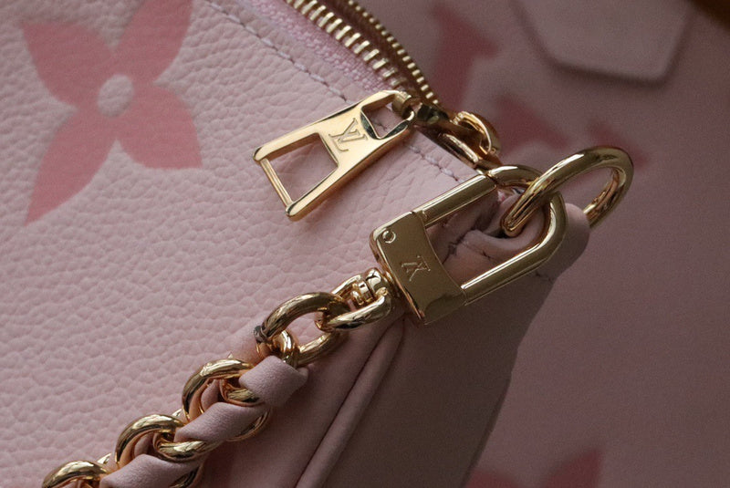Side profile of refined classic women's handbag – women's statement bag