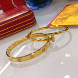 Front view of Cartier unisex jewelry piece