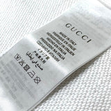 Close-up detail shot of Gucci luxury clothing with relaxed-fit cut