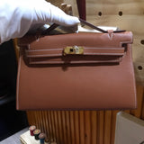 Side view of curated structured handbag