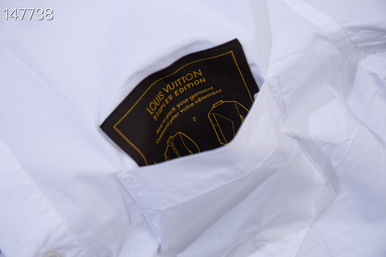 Flat lay presentation of Louis Vuitton luxury clothing with monogram-inspired silhouette
