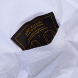 Flat lay presentation of Louis Vuitton luxury clothing with monogram-inspired silhouette