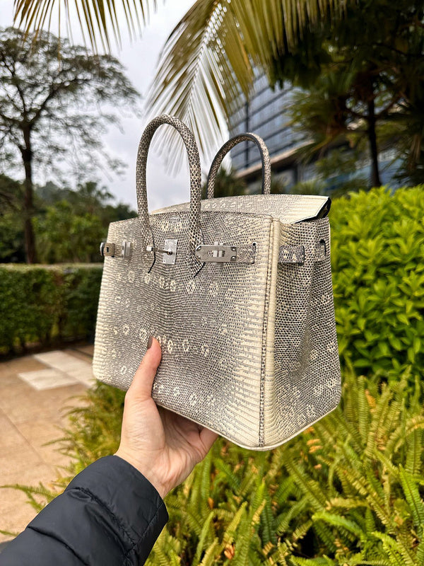 Side view of contemporary structured handbag