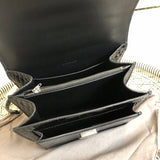 Side profile of chic polished women's handbag – women's everyday handbag