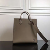 Side profile of statement structured women's handbag – women's everyday handbag