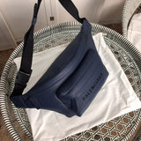 Handle and strap detail of statement modern women's handbag – women's luxury handbag