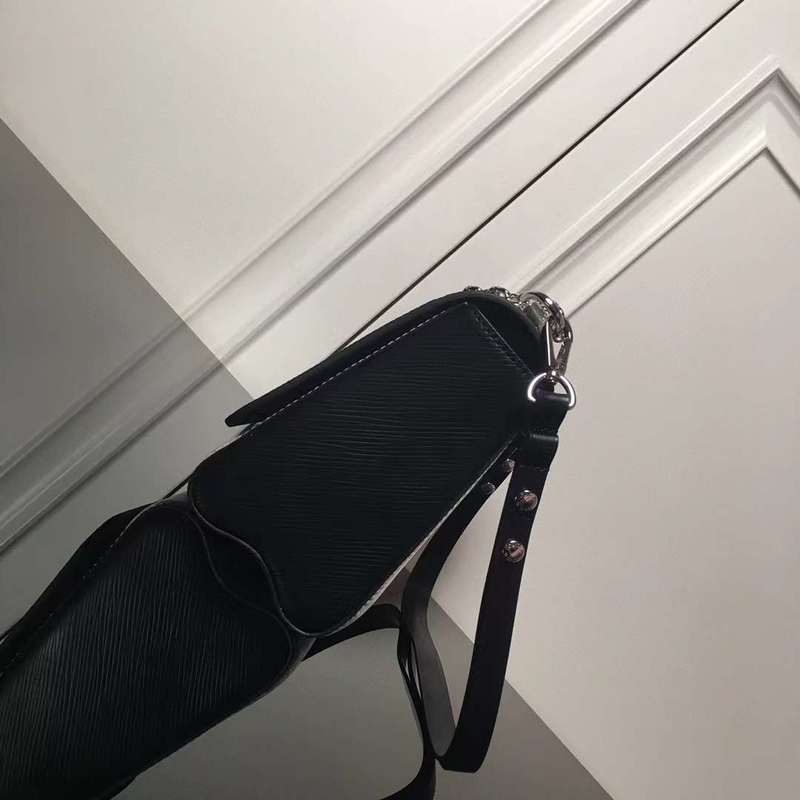 Styled lifestyle shot of structured everyday-luxe women's handbag – women's everyday handbag
