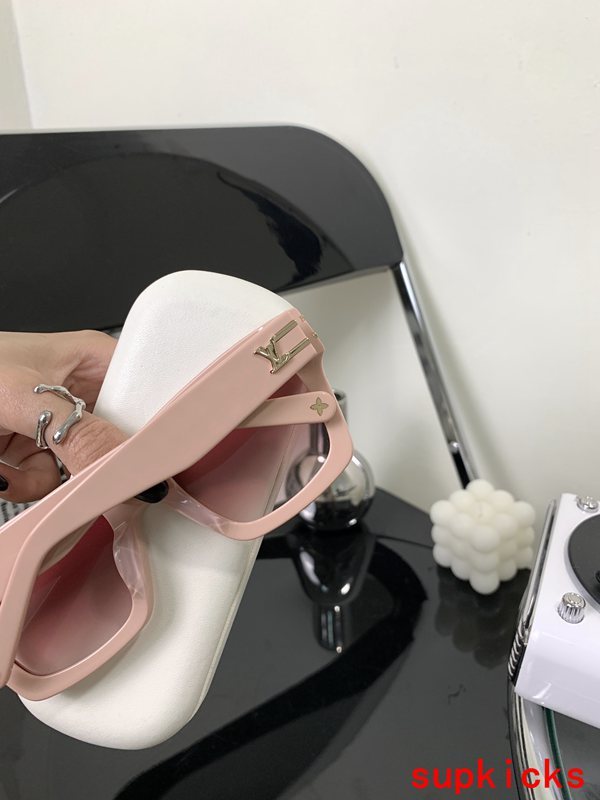 Angled view of Louis Vuitton unisex sunglasses
