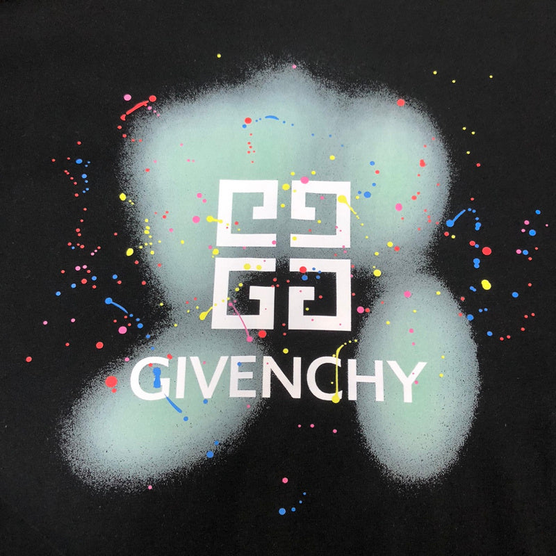 Flat lay presentation of Givenchy luxury clothing with tailored silhouette